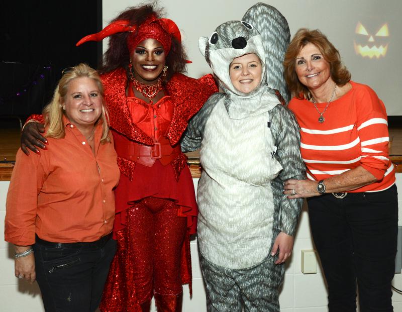 Gathered for a photo (l-r) are Cassandra Toroian, board member; Jenell Collins; Meghan Foxx, executive director; and board member Mary Kay Settembrini.